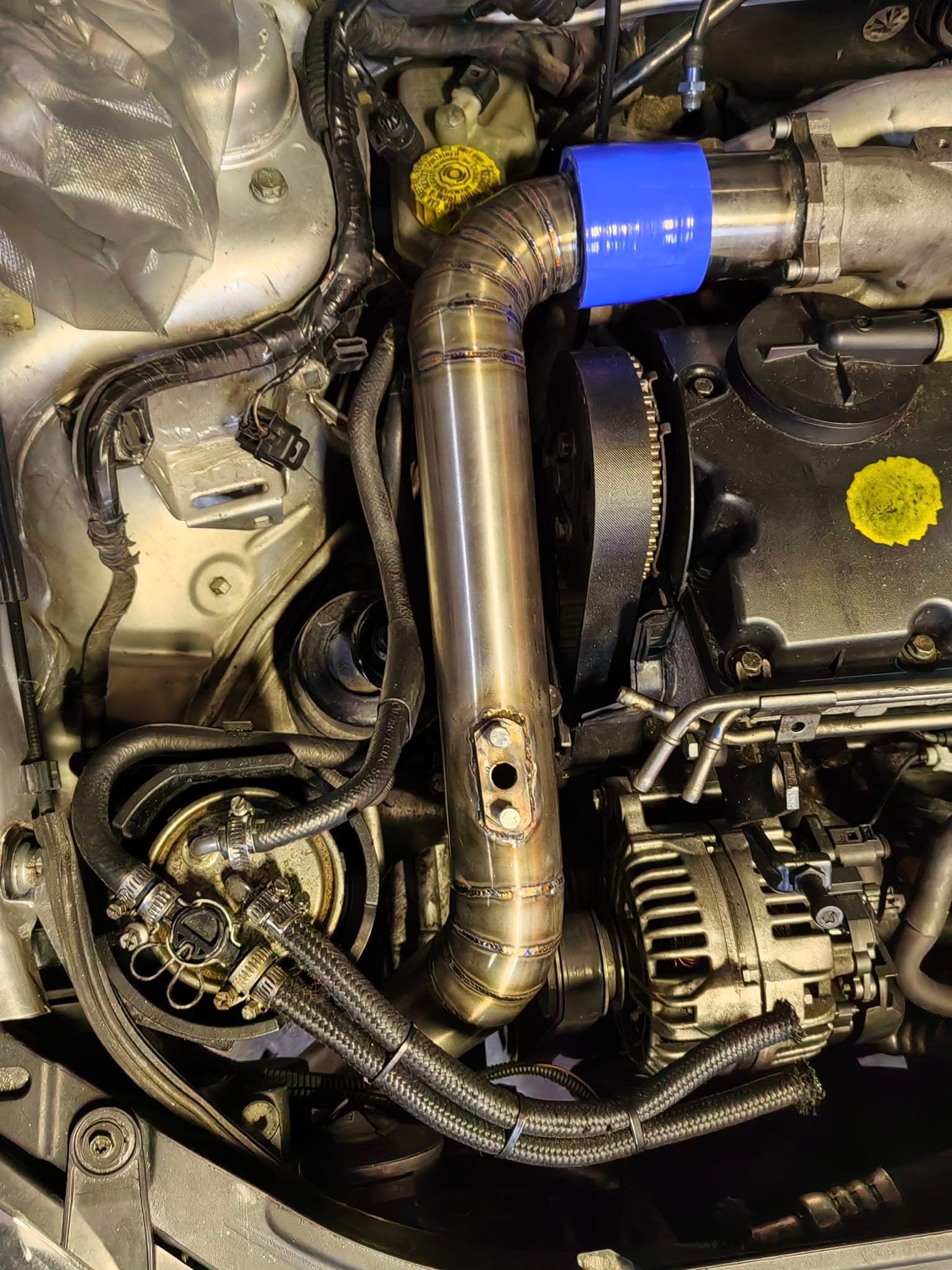 Fabricated boost pipe installed in a 1.9 TDI engine bay